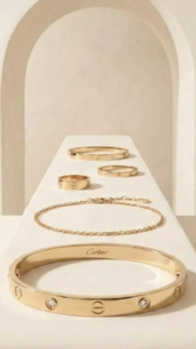 cartier jewelry composition multiple pieces museum like aesthetic ivory background
