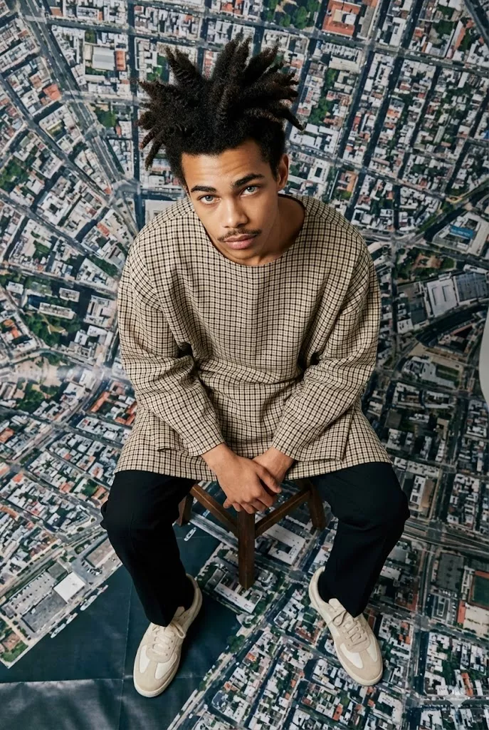 top down overhead editorial portrait man city map floor